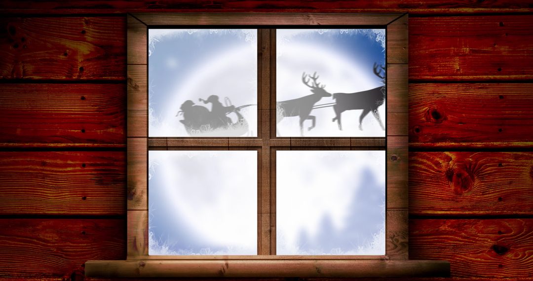 Silhouette of Santa Claus Sleigh with Reindeers on Moonlit Night