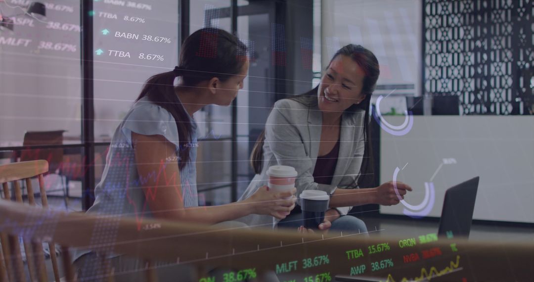 Business Analytics with Female Colleagues Collaborating in Office