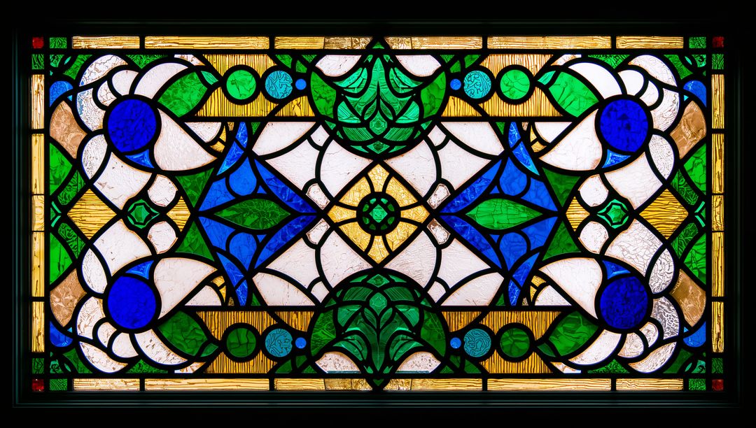 Art Nouveau Style Stained Glass with Blue and Green Patterns