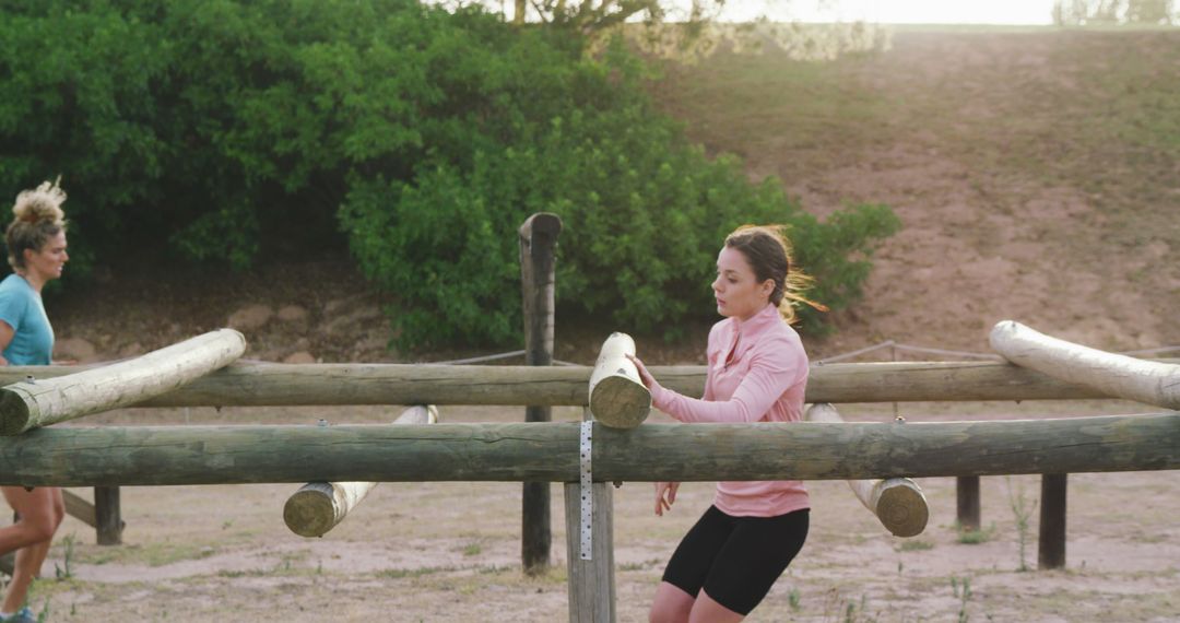 Women Training on Obstacle Course in Outdoor Park - Free Images, Stock Photos and Pictures on Pikwizard.com