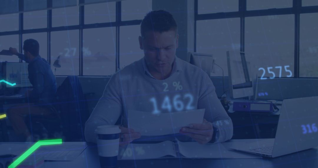Professional Reviewing Documents in Office with Financial Charts Overlay