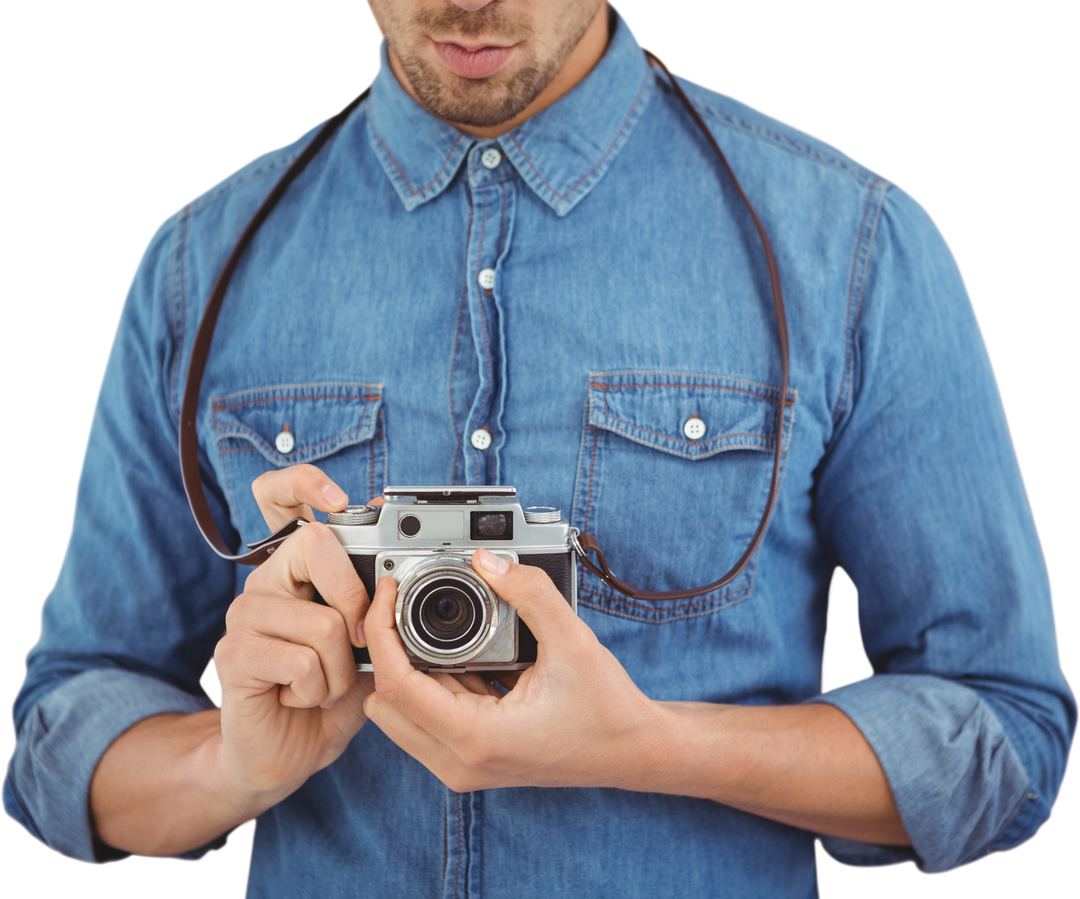 Mid Section of Man Operating Vintage Camera Wearing Denim Shirt - Download Free Stock Images Pikwizard.com