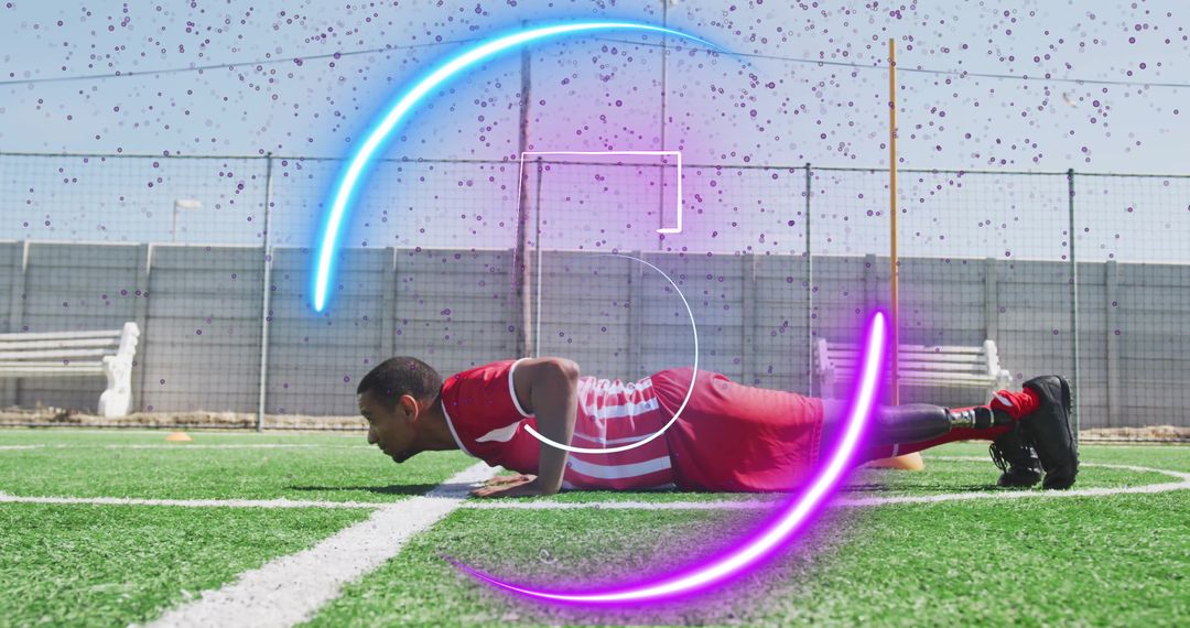 Athlete Doing Pushups on Soccer Field with Neon Effects