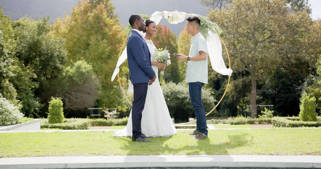 Outdoor Wedding Ceremony with smiling Bride and Groom - Free Images, Stock Photos and Pictures on Pikwizard.com