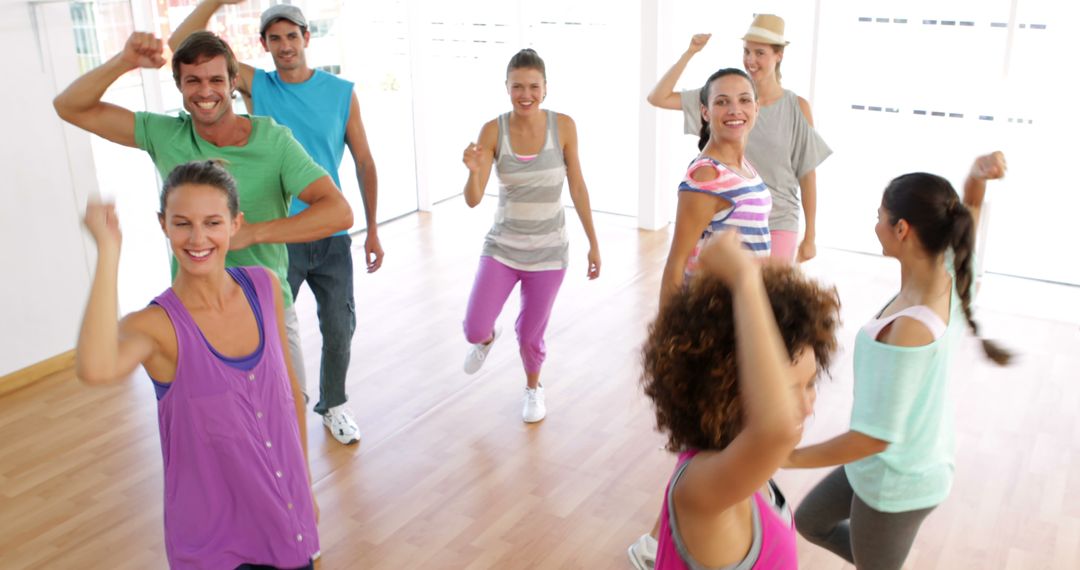 Group of Diverse Adults Enjoying Aerobics Dance Class in Studio - Free Images, Stock Photos and Pictures on Pikwizard.com