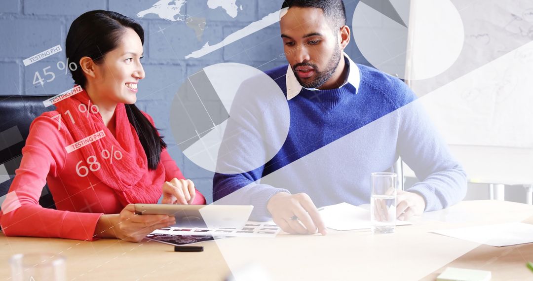 Diverse Professionals Analyzing Financial Data During Meeting