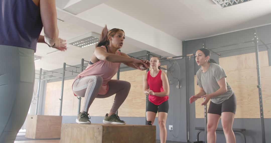 Women Encouraging Each Other during Intense Box Jump Workout - Free Images, Stock Photos and Pictures on Pikwizard.com