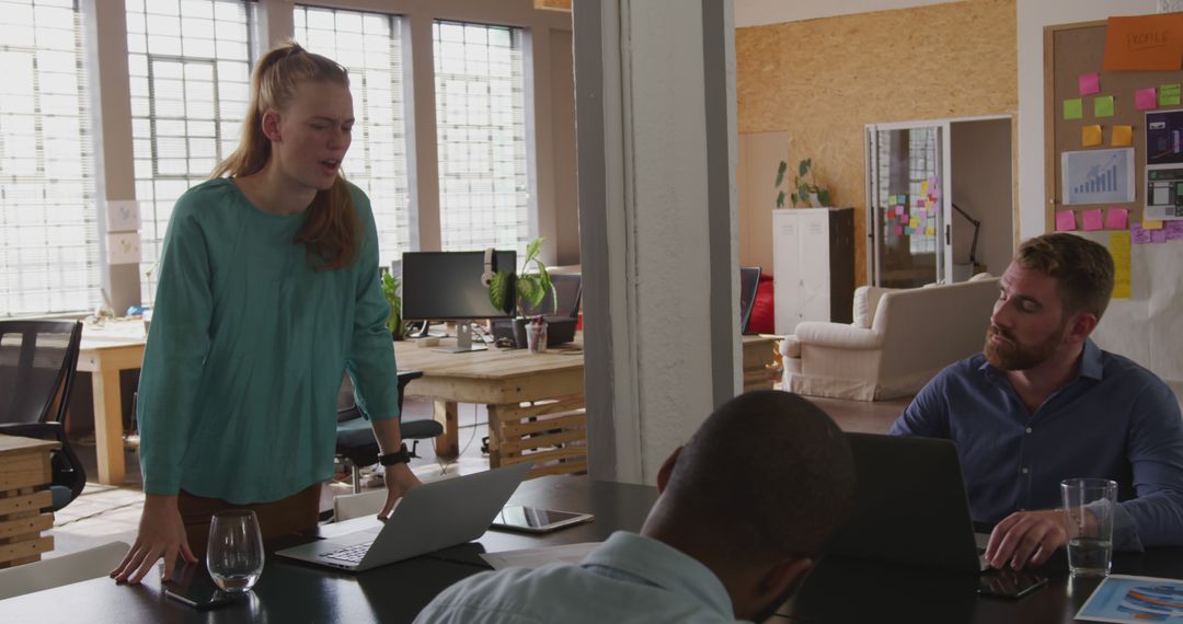 Creative Professionals Brainstorming in Modern Office Environment