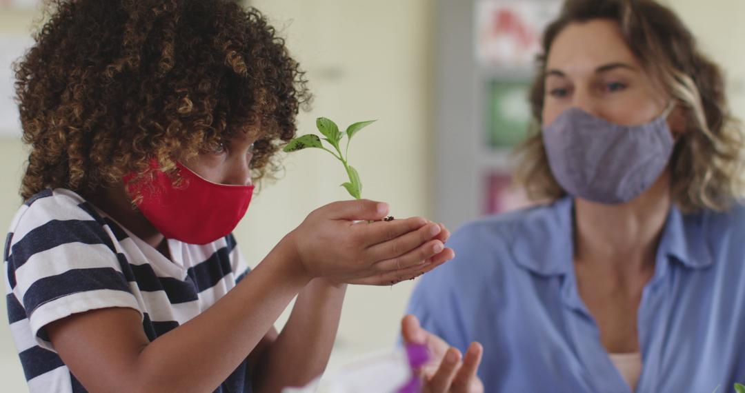 Teacher and Child Learning About Plants While Wearing Masks - Free Images, Stock Photos and Pictures on Pikwizard.com