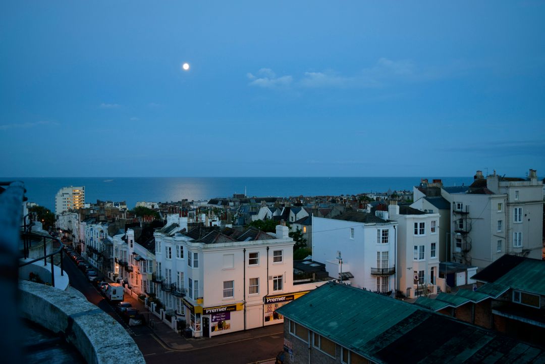 Moonlit Coastal Townscape at Twilight - Free Images, Stock Photos and Pictures on Pikwizard.com