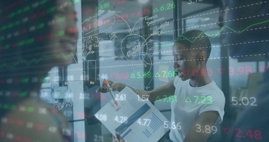 Diverse Professionals Analyzing Financial Data Projections