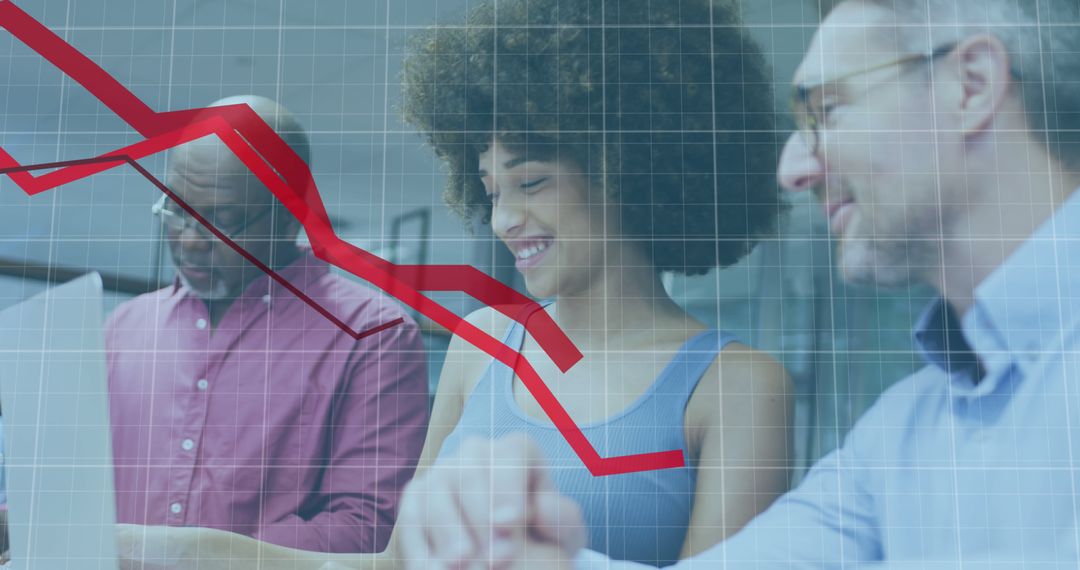 Diverse Team Analyzing Financial Downtrend Data in Modern Office