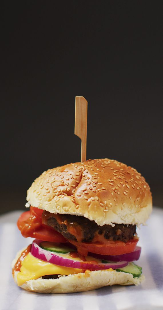 Appetizing Homemade Burger With Fresh Vegetables and Cheese