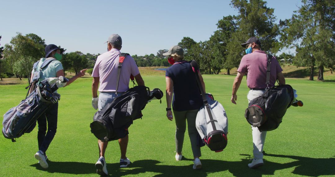 Active Seniors Walking on Golf Course with Protective Masks