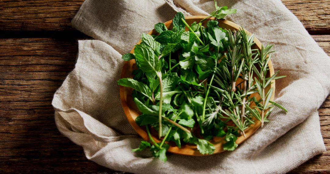 Fresh Herbs Mix in Wooden Bowl on Rustic Table - Free Images, Stock Photos and Pictures on Pikwizard.com