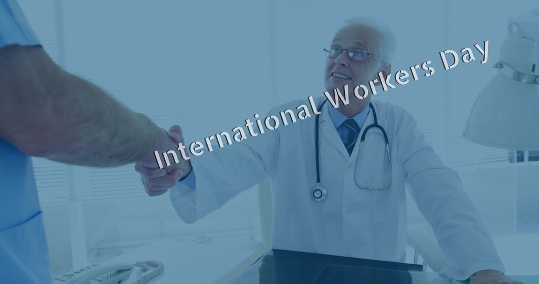 Senior Doctor Shaking Hands with Younger Colleague on International Workers' Day - Free Images, Stock Photos and Pictures on Pikwizard.com