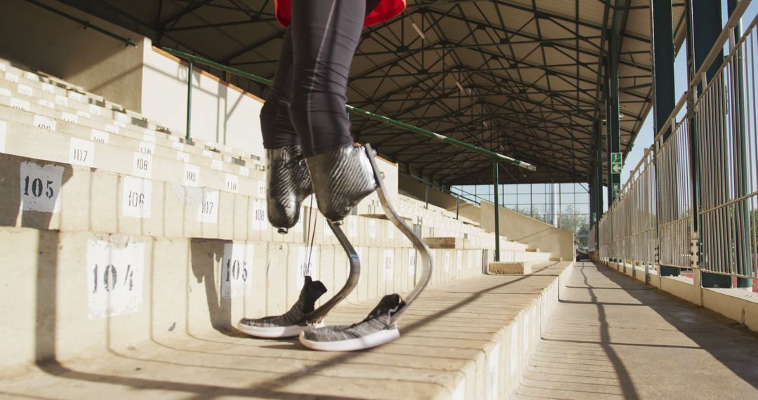 Adaptive Athlete Training on Stadium Steps with Prosthetic Legs - Free Images, Stock Photos and Pictures on Pikwizard.com