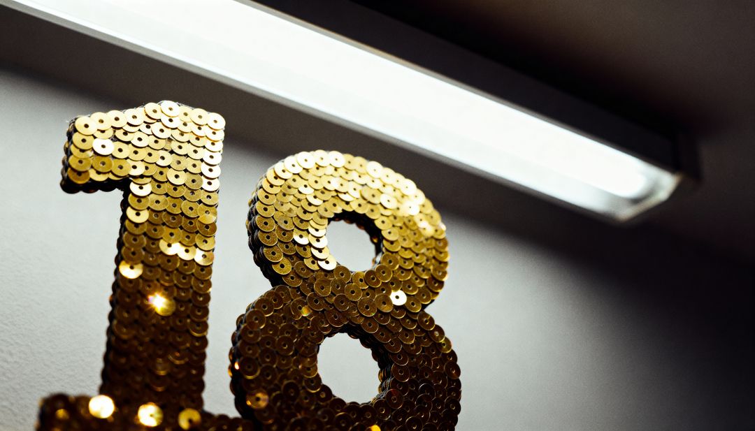 Glittering Gold Sequin Number 18 Reflecting Fluorescent Light for Birthday Decoration