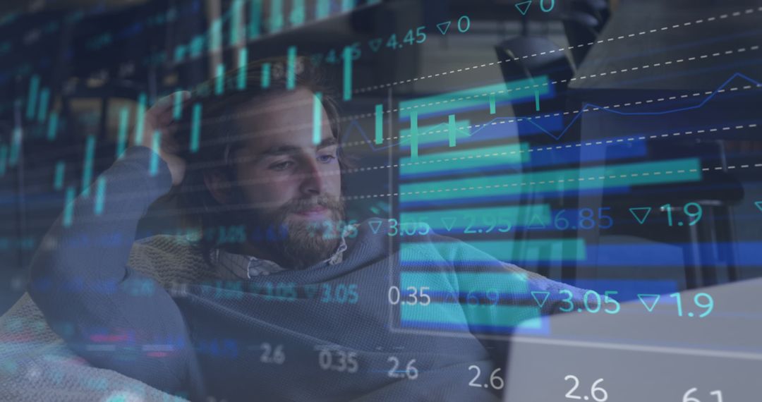 Tired Businessman Analyzing Data on Laptop