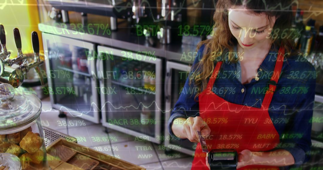 Female Barista in Red Apron using POS System with Stock Market Overlay - Free Images, Stock Photos and Pictures on Pikwizard.com