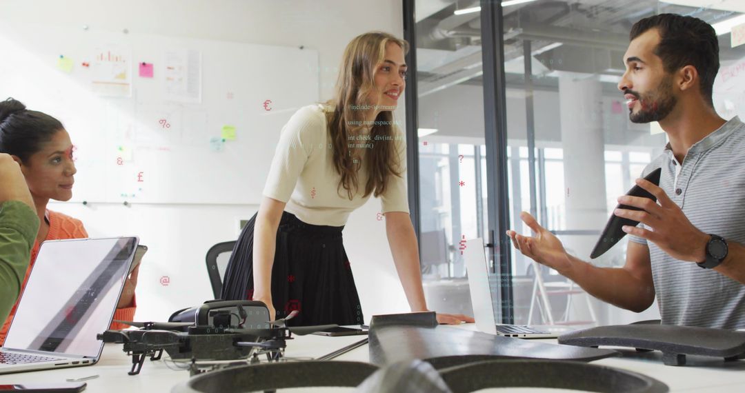 Diverse Team Collaborating in Modern Office with Drone