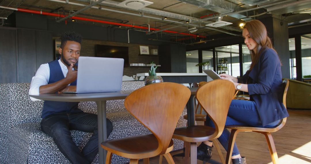 Young Professionals Working in Modern Open Office Space