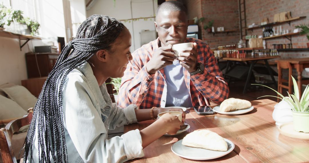 Couple Enjoying Coffee Date in Cozy Urban Cafe