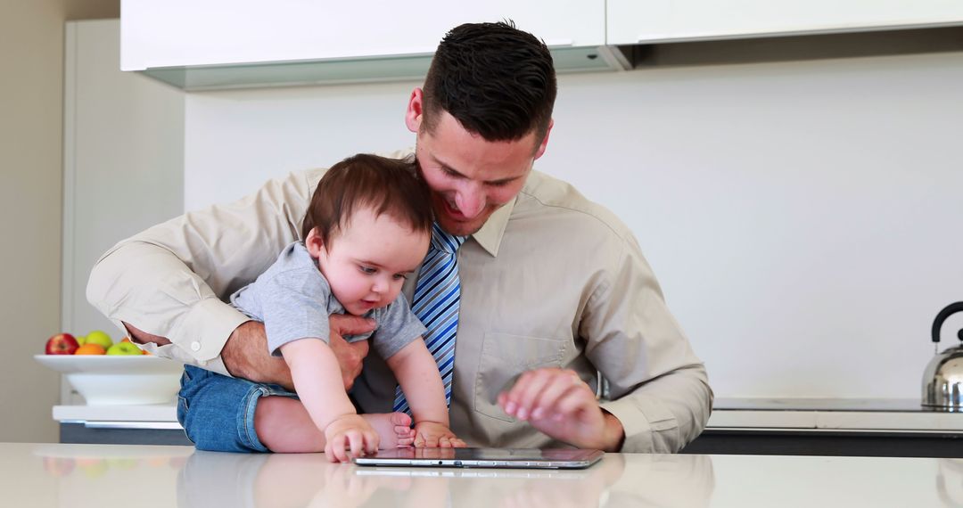 Businessman Multitasking with Baby on Digital Tablet at Home - Free Images, Stock Photos and Pictures on Pikwizard.com