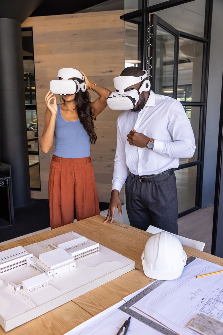 Team Exploring Architectural Model Using VR Technology in Meeting Room