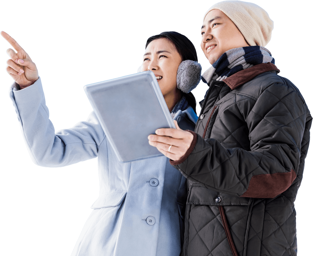 Couple in Winter Clothing Pointing and Holding Tablet on Transparent Background