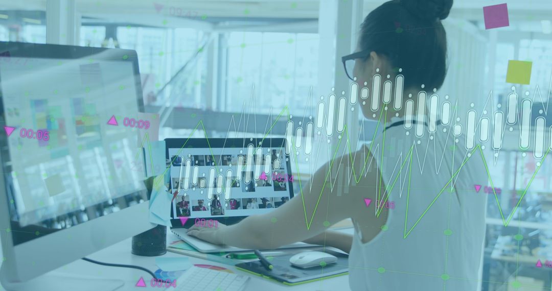 Businesswoman Analyzing Data with Laptop and Charts