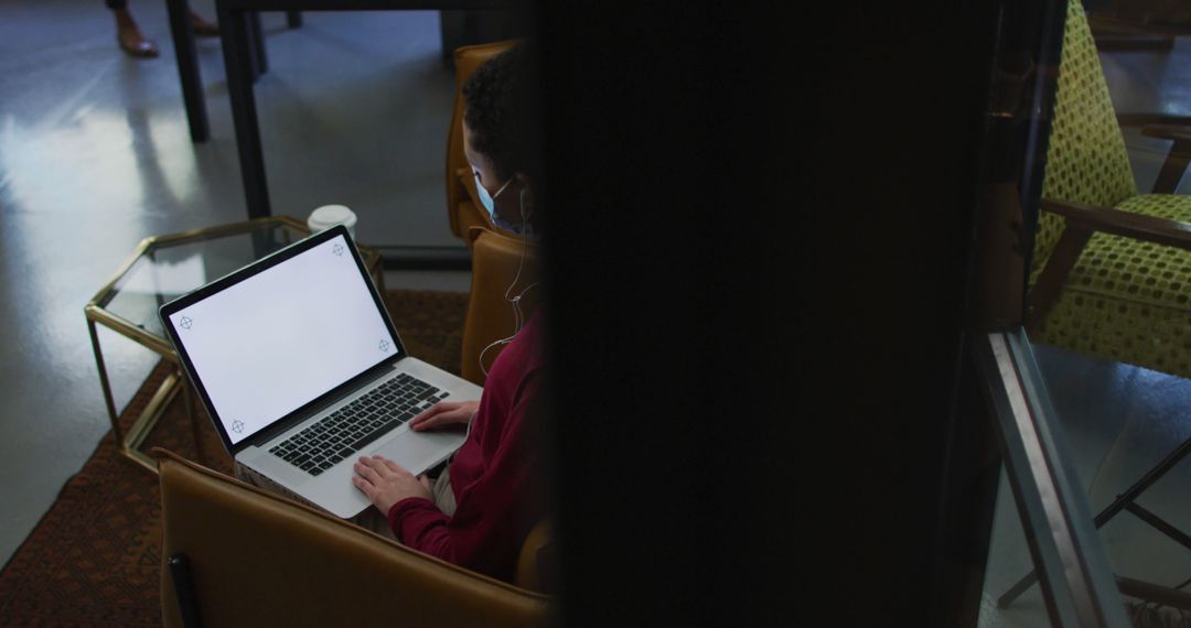 Remote Meeting in Modern Office with Safety Precautions