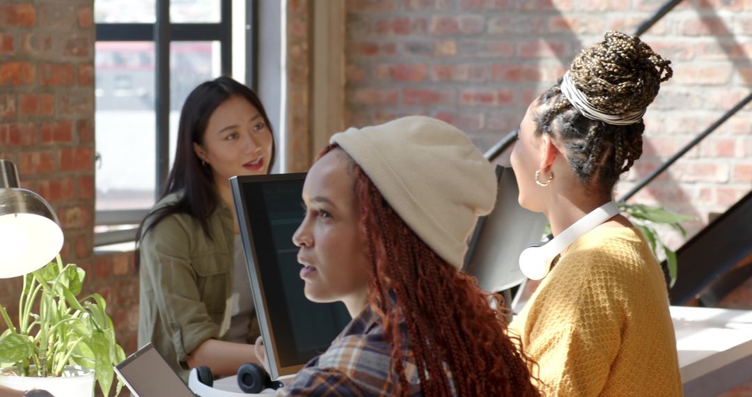 Diverse Professionals in Office Collaborating on Project