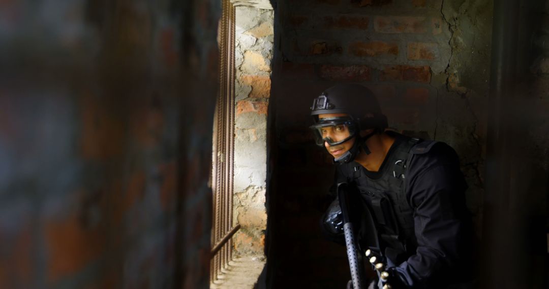 Soldier Holding Rifle Looking Through Window During Military Exercise