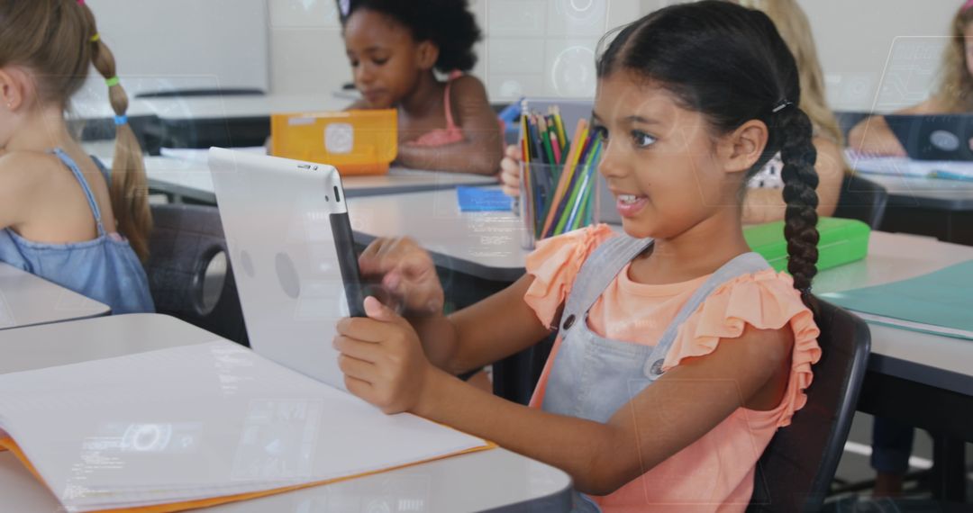 Diverse Schoolchildren Engaged with Digital Tablet Learning