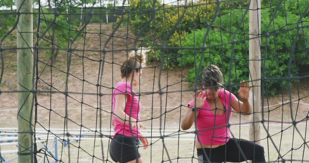 Women Engaging in Outdoor Obstacle Course Activity - Free Images, Stock Photos and Pictures on Pikwizard.com