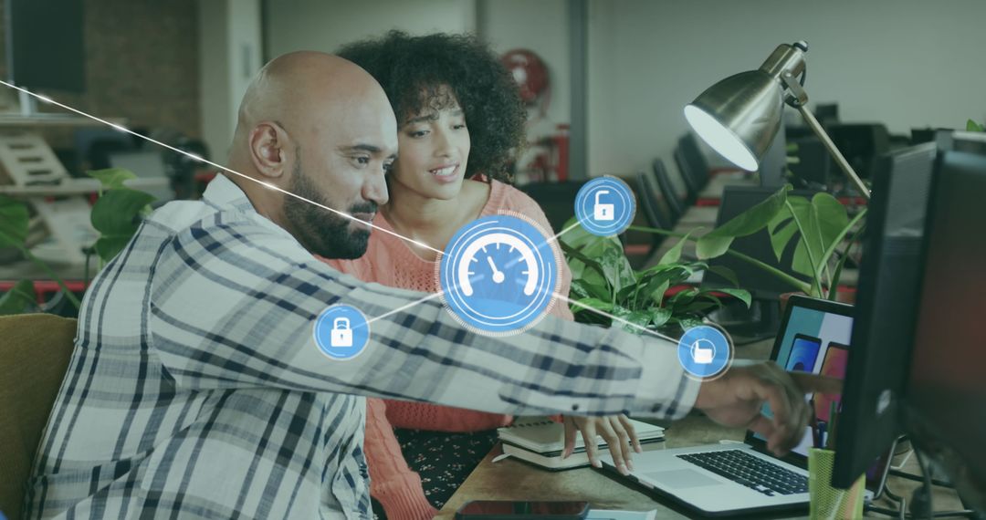Diverse Team Collaborating on Digital Project with Integrated Security Icons