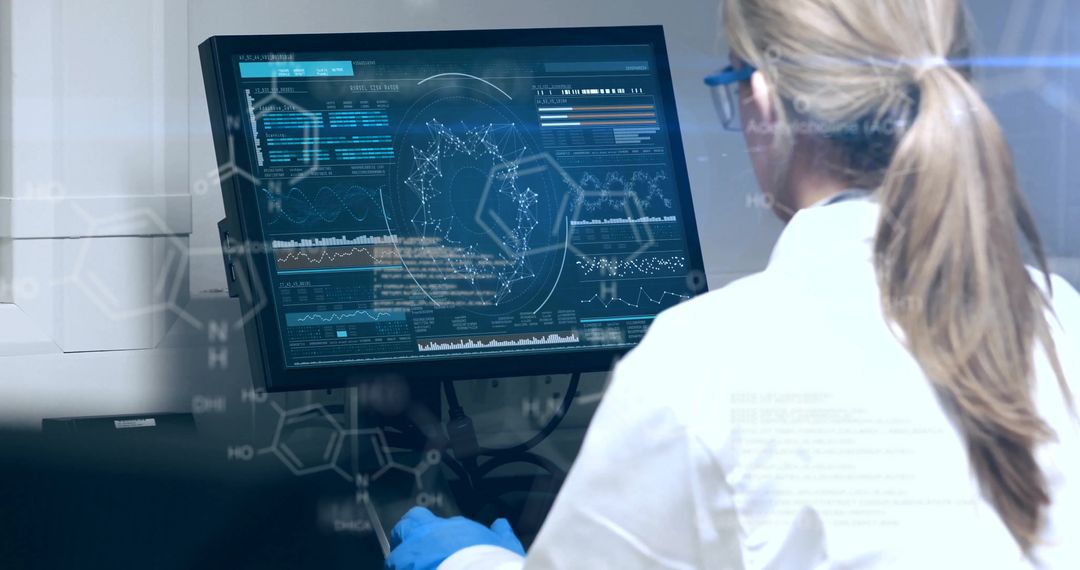 Female Scientist Analyzing Digital Scientific Data in Laboratory
