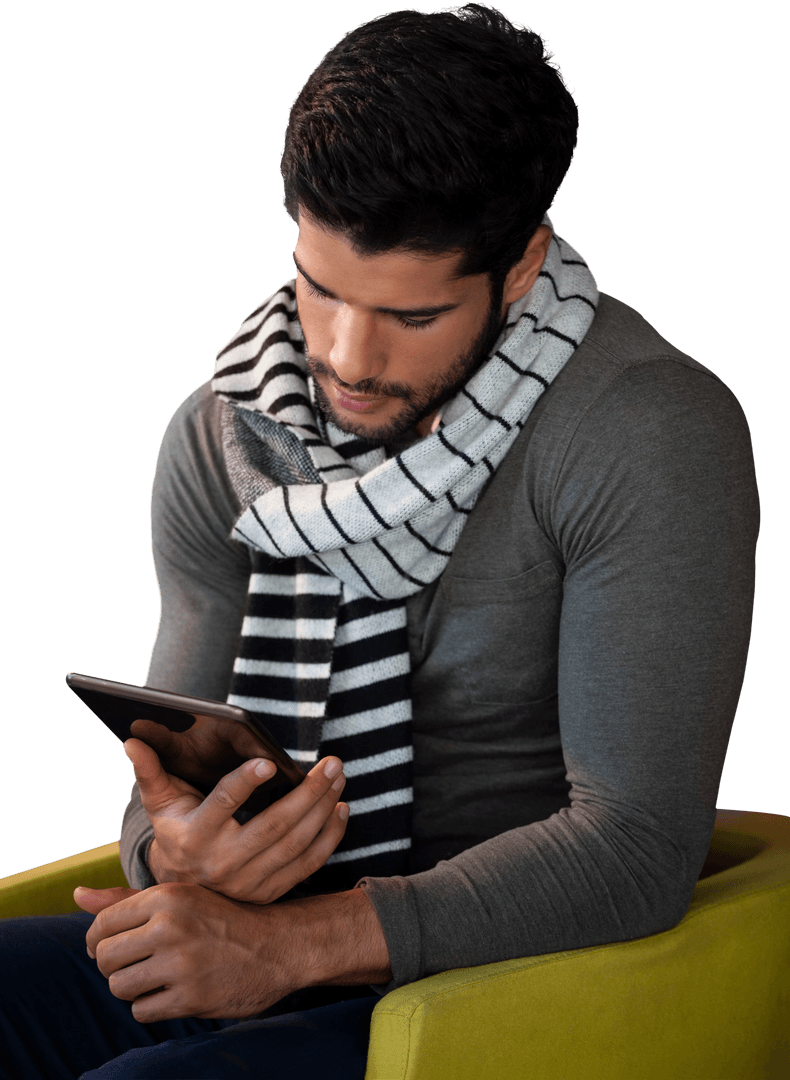 Man Using Digital Device Seated on Chair with Scarf and Grey Shirt