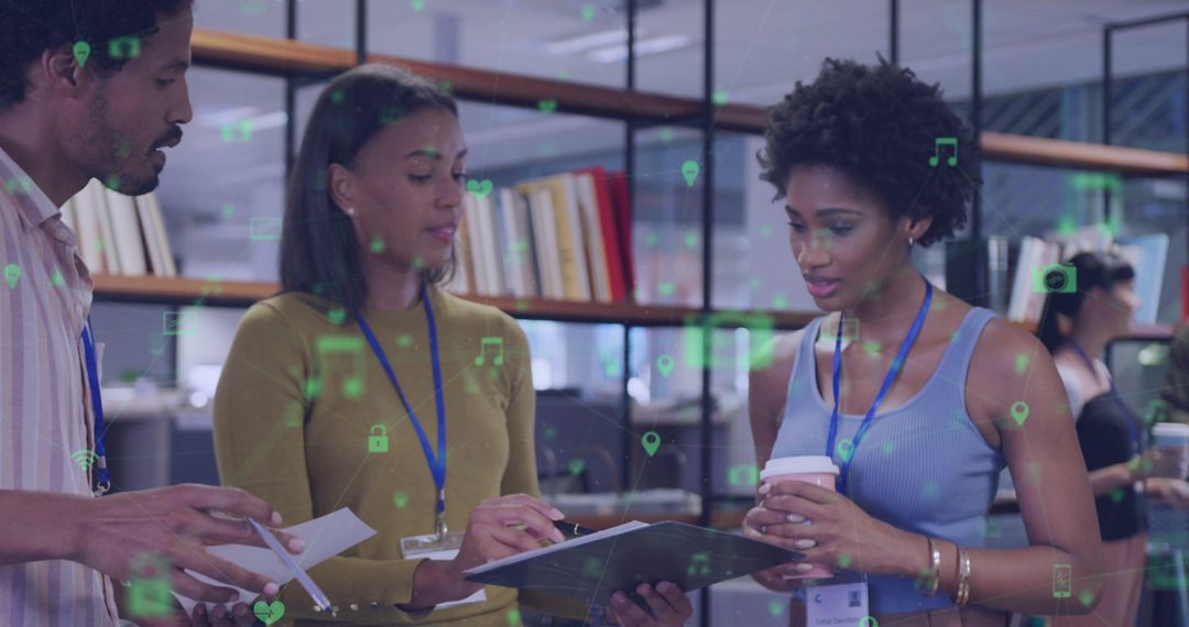 Diverse Business Team Intently Collaborating in Modern Office