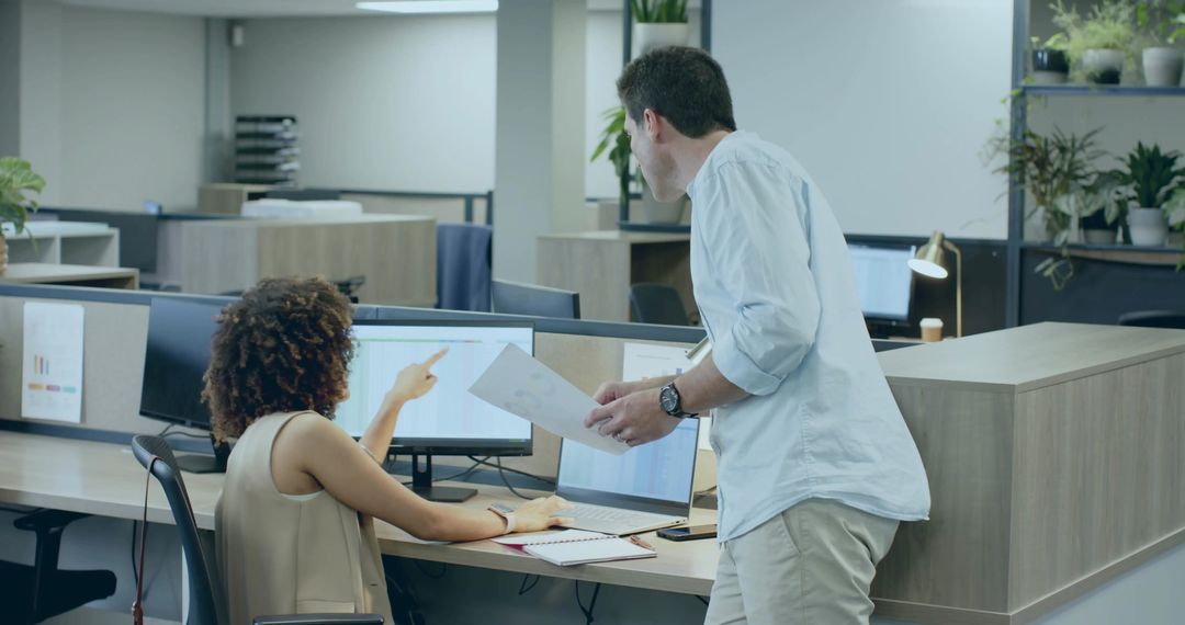 Team Collaboration at Modern Open Plan Office with Technology