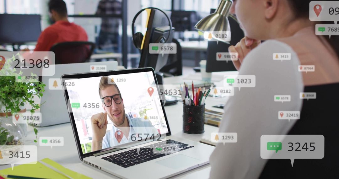 Woman watching remote mentor during video call with floating notification overlays