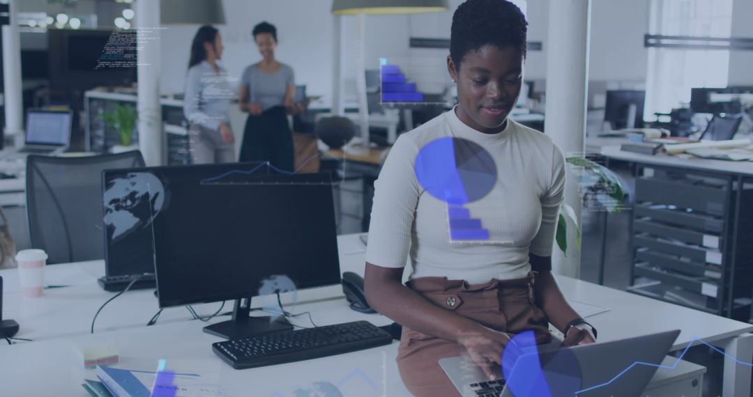 Modern Open-Plan Office with Woman Working on Laptop