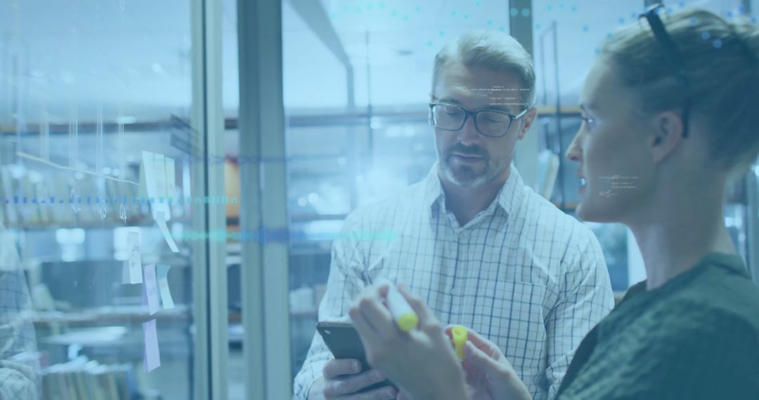 Co-Workers Brainstorming with Digital Technology in Modern Office