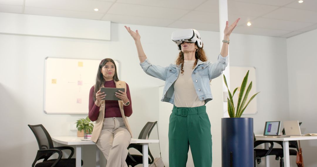 Diverse Professionals Engaging with Technology in Modern Office