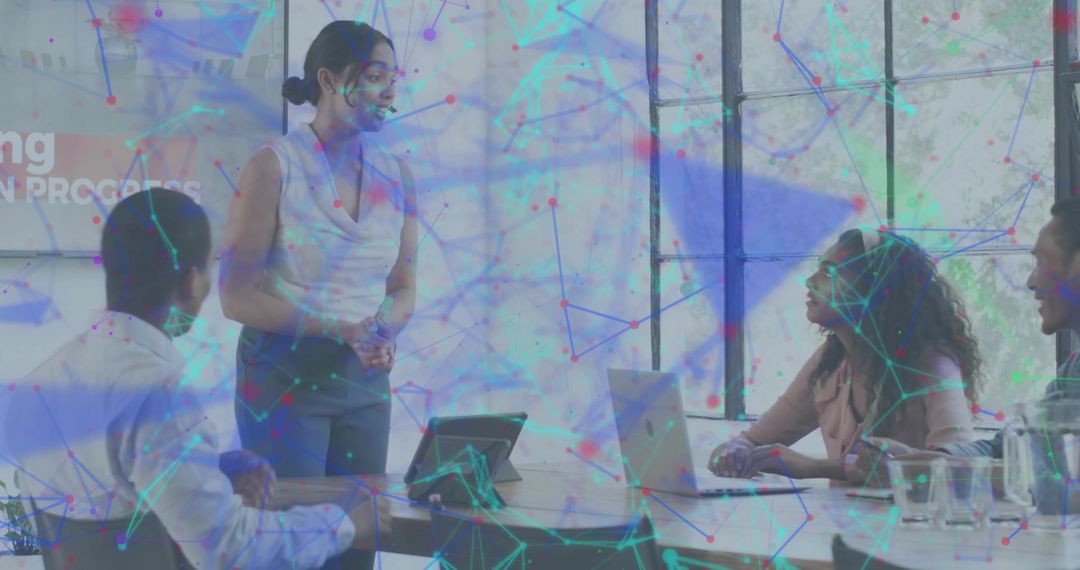 Woman Leading Team Presenting Strategy in Bright Office, Collaboration and Digital Network