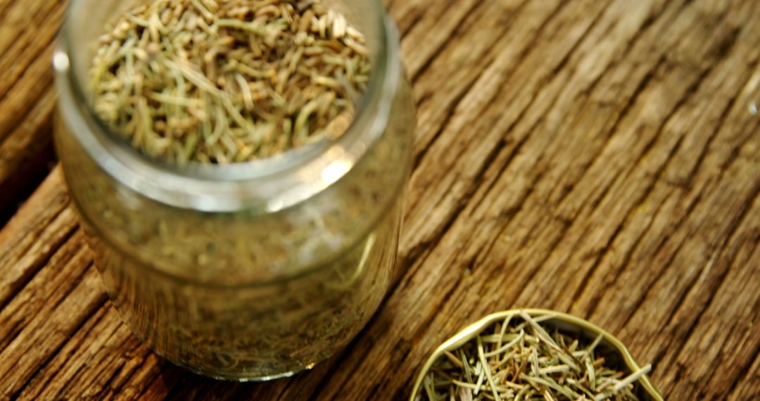 Dried Herbs in Glass Jar on Rustic Wooden Table - Free Images, Stock Photos and Pictures on Pikwizard.com