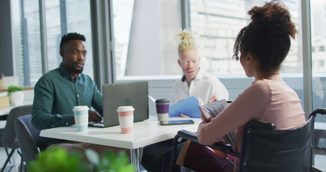 Inclusive Business Meeting with Diverse Team Collaborating