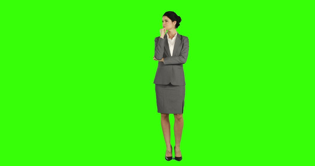 Businesswoman Pondering on a Green Screen Background - Free Images, Stock Photos and Pictures on Pikwizard.com