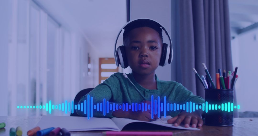 Young Boy Engaging in E-Learning with Headphones and Sound Waves